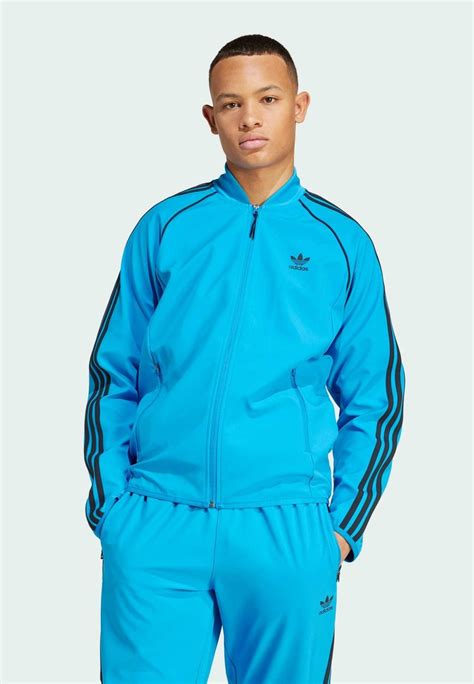 adidas traininjack blauw kind